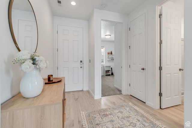 5451 N Yeager Ln, Eagle Mountain, UT 84005 - foyer with light wood-type flooring and baseboards