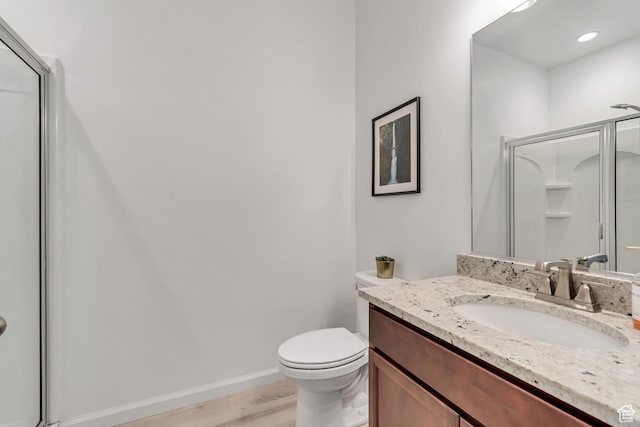 5451 N Yeager Ln, Eagle Mountain, UT 84005 - full bathroom featuring vanity, a shower with shower door, and wood finished floors