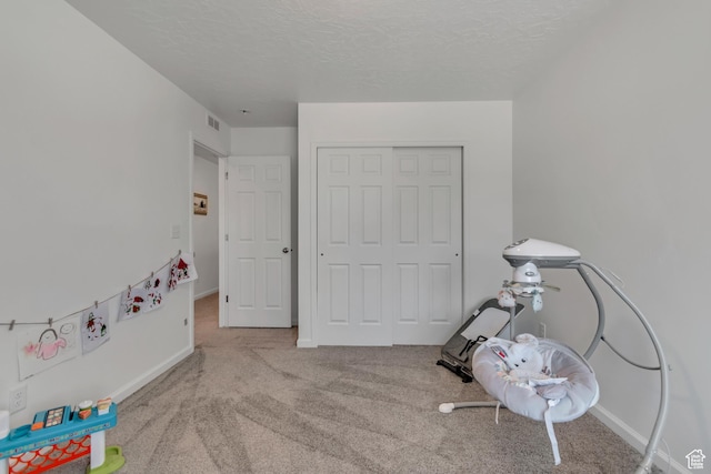 5451 N Yeager Ln, Eagle Mountain, UT 84005 - recreation room with carpet flooring and a textured ceiling