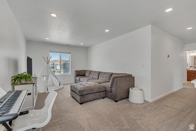5451 N Yeager Ln, Eagle Mountain, UT 84005 - living room with carpet floors, recessed lighting, and a textured ceiling