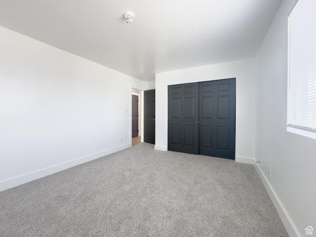 34 E 1450 S, Orem, UT 84058 - unfurnished bedroom with carpet floors and a closet