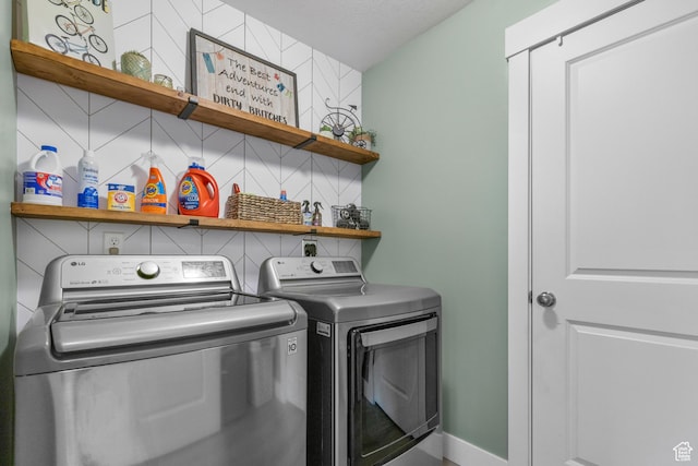 2122 W 1745th Ct S, West Haven, UT 84401 - washroom with washing machine and dryer and baseboards