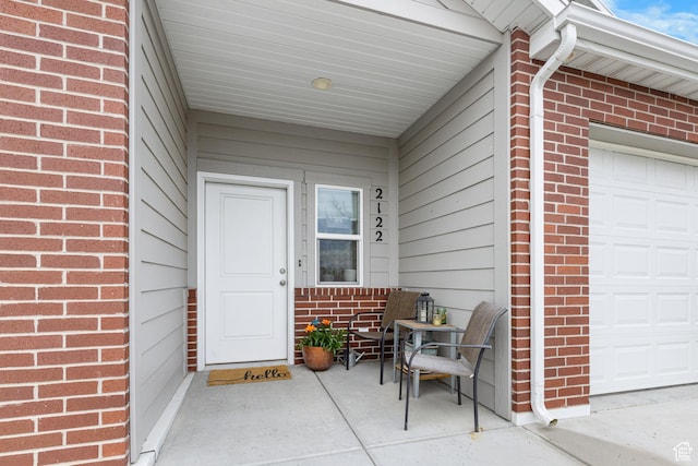 2122 W 1745th Ct S, West Haven, UT 84401 - property entrance with brick siding and a garage