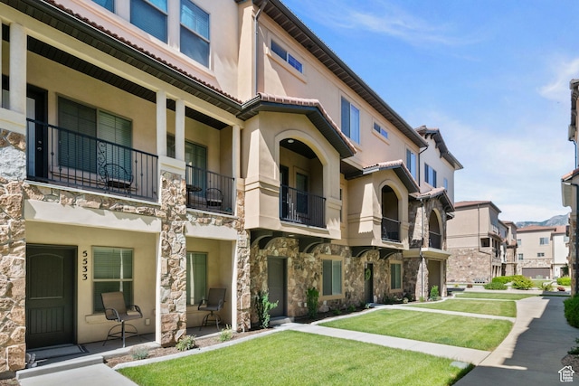 5529 W Sicily Ln N, Highland, UT 84003 - view of building exterior with a residential view