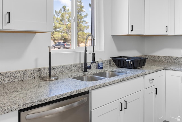 511 S 600 W, Hurricane, UT 84737 - kitchen with dishwasher, white cabinetry, and light stone countertops