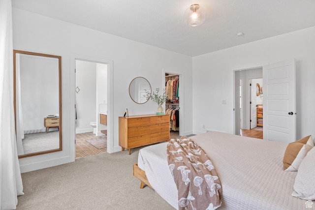 2245 W 800 S, Layton, UT 84041 - carpeted bedroom featuring a walk in closet, a closet, and ensuite bath