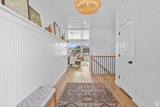 2245 W 800 S, Layton, UT 84041 - hallway with an upstairs landing and light wood-type flooring