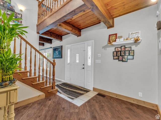 11551 S Woodhampton Dr E, Sandy, UT 84092 - entrance foyer with a wooden ceiling with exposed beams, wood finished floors, and stairs