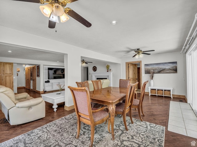 11551 S Woodhampton Dr E, Sandy, UT 84092 - dining space with a ceiling fan, a fireplace, wood finished floors, and recessed lighting