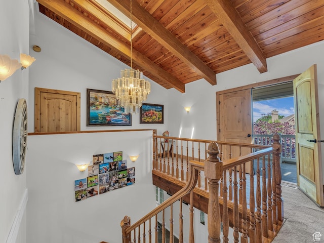 11551 S Woodhampton Dr E, Sandy, UT 84092 - hall with an upstairs landing, wooden ceiling, carpet flooring, and a chandelier