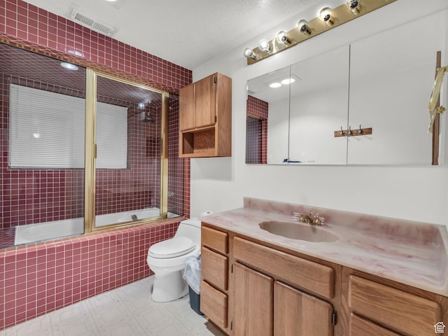 11551 S Woodhampton Dr E, Sandy, UT 84092 - bathroom with tiled shower / bath, vanity, and tile patterned floors