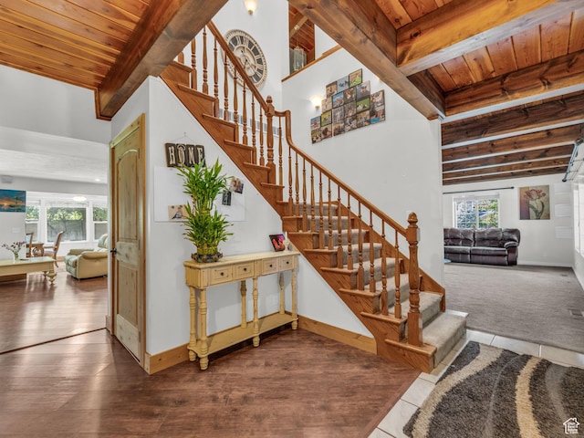11551 S Woodhampton Dr E, Sandy, UT 84092 - staircase with a wooden ceiling with exposed beams, plenty of natural light, and wood finished floors
