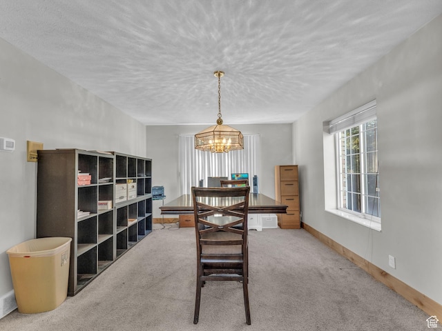 11551 S Woodhampton Dr E, Sandy, UT 84092 - dining room with a chandelier, a textured ceiling, and carpet flooring