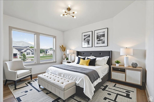 954 S Sandy Ln, Spanish Fork, UT 84660 - bedroom featuring wood finished floors and a chandelier