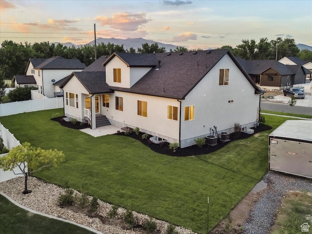 954 S Sandy Ln, Spanish Fork, UT 84660 - rear view of property featuring roof with shingles and stucco siding