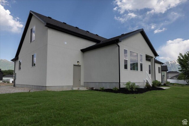 954 S Sandy Ln, Spanish Fork, UT 84660 - back of house featuring a yard, stucco siding, and a mountain view