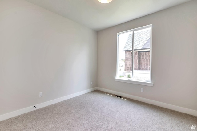 551 W Summerhill Ln, Centerville, UT 84014 - empty room featuring healthy amount of natural light and carpet flooring