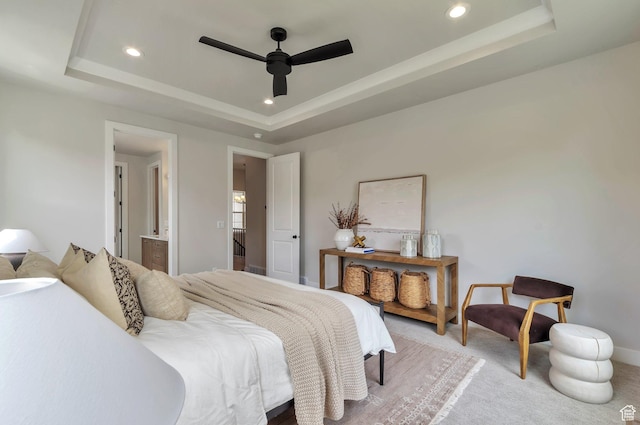 551 W Summerhill Ln, Centerville, UT 84014 - bedroom featuring a tray ceiling, recessed lighting, light colored carpet, ensuite bathroom, and ceiling fan