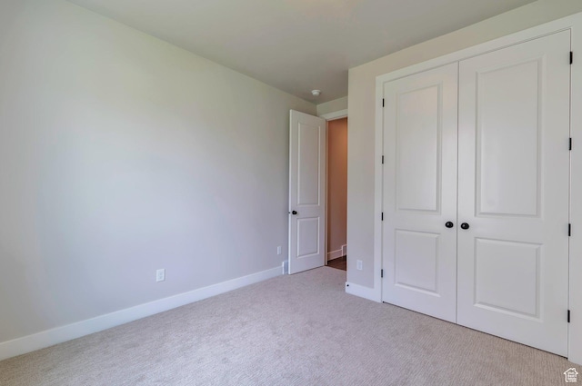 551 W Summerhill Ln, Centerville, UT 84014 - unfurnished bedroom featuring carpet flooring and a closet