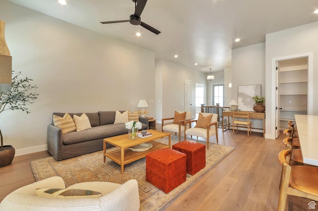 551 W Summerhill Ln, Centerville, UT 84014 - living area with a ceiling fan, light wood-type flooring, recessed lighting, and built in features