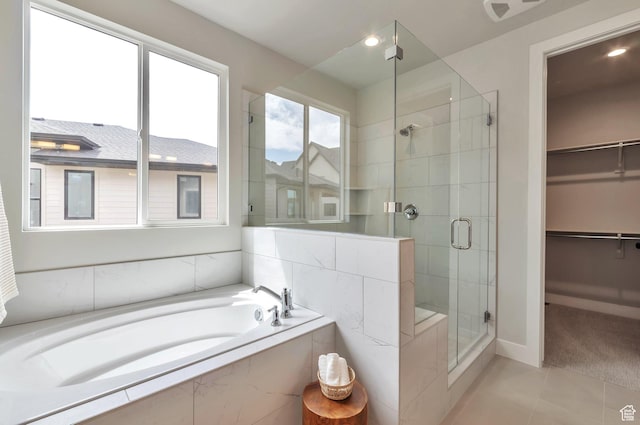 551 W Summerhill Ln, Centerville, UT 84014 - full bathroom with a shower stall, tile patterned floors, a garden tub, a spacious closet, and recessed lighting