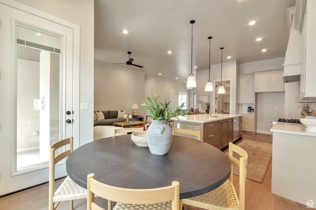 551 W Summerhill Ln, Centerville, UT 84014 - dining room with light wood-style floors, a ceiling fan, and recessed lighting