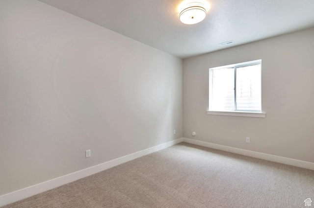 551 W Summerhill Ln, Centerville, UT 84014 - spare room featuring light colored carpet