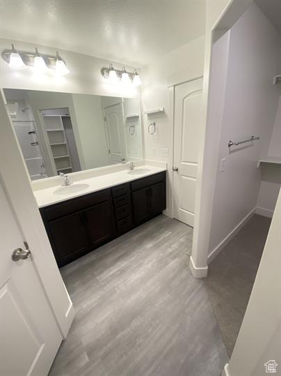 3985 W 1960 N, Lehi, UT 84043 - bathroom featuring double vanity and wood finished floors