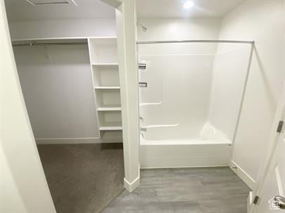 3985 W 1960 N, Lehi, UT 84043 - full bath featuring shower / bathtub combination, a spacious closet, and wood finished floors