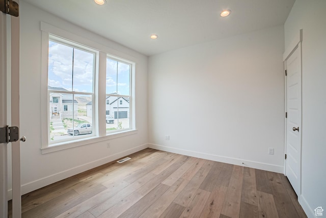 1272 S Boxelder Dr, Saratoga Springs, UT 84005 - spare room with light wood finished floors and recessed lighting