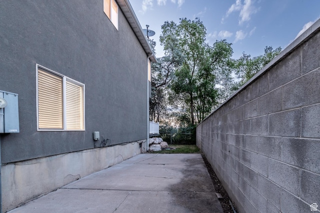 1282 W 1200 S, Woods Cross, UT 84087 - view of home's exterior with a patio area and stucco siding