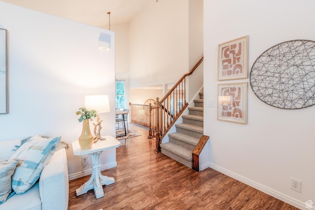 1282 W 1200 S, Woods Cross, UT 84087 - stairway featuring a high ceiling and wood finished floors