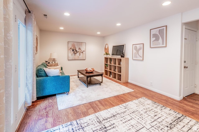 1282 W 1200 S, Woods Cross, UT 84087 - living area featuring light wood-style flooring and recessed lighting