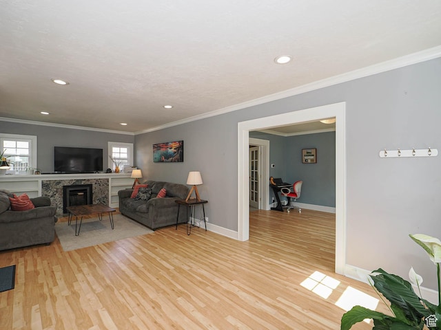 1527 E Princeton Ave S, Salt Lake City, UT 84105 - living room with light wood-style floors, recessed lighting, ornamental molding, and a fireplace