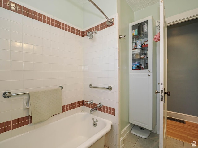 1527 E Princeton Ave S, Salt Lake City, UT 84105 - bathroom with tile patterned flooring and shower / washtub combination