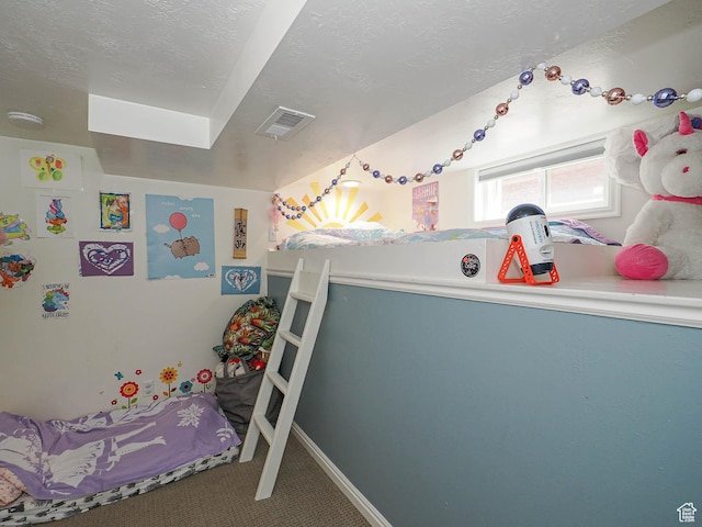 1527 E Princeton Ave S, Salt Lake City, UT 84105 - bedroom featuring carpet floors and a textured ceiling