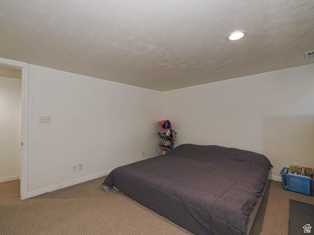 1527 E Princeton Ave S, Salt Lake City, UT 84105 - bedroom featuring carpet flooring, a textured ceiling, and recessed lighting