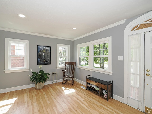 1527 E Princeton Ave S, Salt Lake City, UT 84105 - living area featuring healthy amount of natural light, light wood-style flooring, crown molding, and recessed lighting