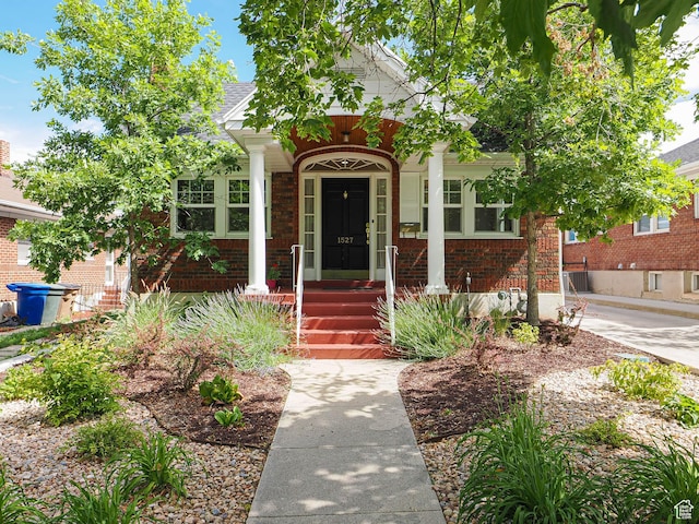 1527 E Princeton Ave S, Salt Lake City, UT 84105 - view of front of property featuring brick siding and a porch