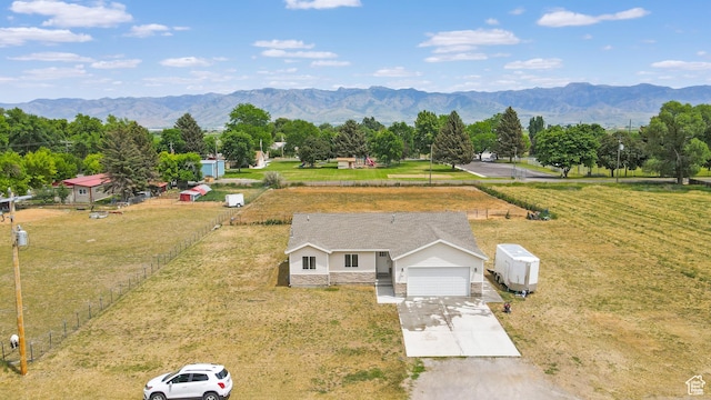 40 S 100 W, Trenton, UT 84338 - aerial view of sparsely populated area with a mountain backdrop
