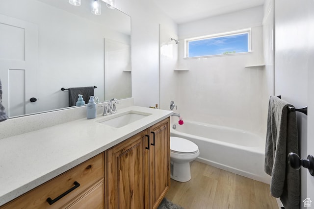 40 S 100 W, Trenton, UT 84338 - bathroom with wood finished floors, vanity, and shower / washtub combination