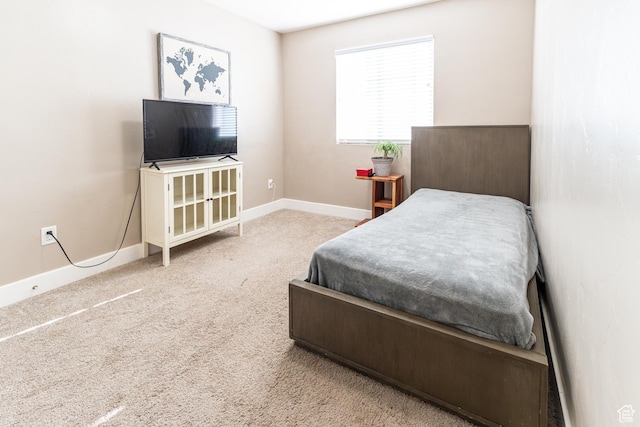 6561 S Evening Glow Ct W, West Jordan, UT 84081 - carpeted bedroom featuring baseboards