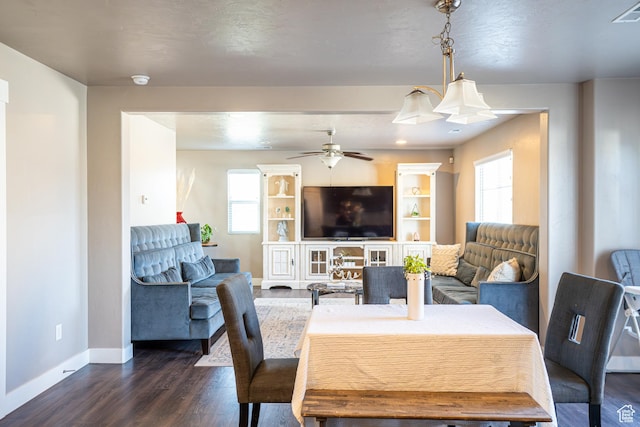 6561 S Evening Glow Ct W, West Jordan, UT 84081 - dining room with healthy amount of natural light, dark wood-type flooring, and ceiling fan