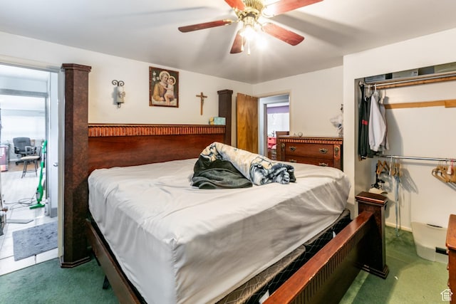 5841 S Fontaine Bleu Dr E, Murray, UT 84121 - bedroom featuring a closet, a ceiling fan, carpet flooring, and access to exterior