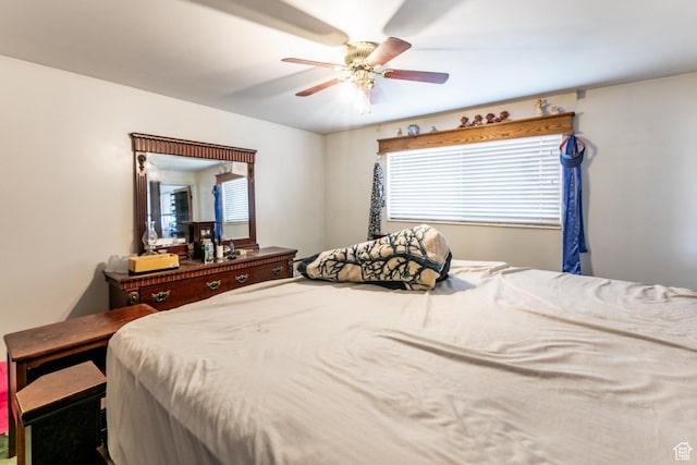 5841 S Fontaine Bleu Dr E, Murray, UT 84121 - bedroom with a ceiling fan