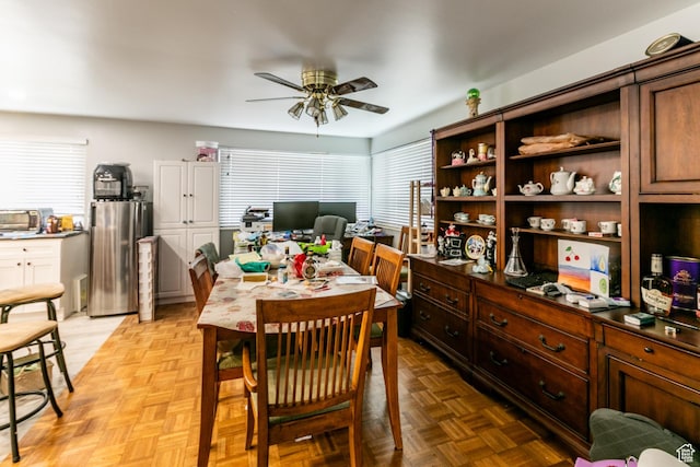 5841 S Fontaine Bleu Dr E, Murray, UT 84121 - dining space with a ceiling fan and a desk