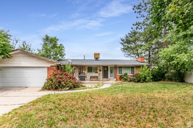 5841 S Fontaine Bleu Dr E, Murray, UT 84121 - ranch-style house featuring a porch, an attached garage, concrete driveway, a front yard, and a chimney