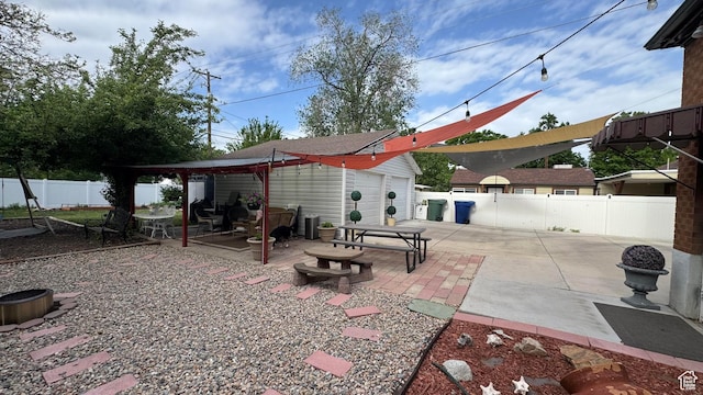 1924 E 2100 S, Salt Lake City, UT 84106 - fenced backyard with a patio and an outdoor structure