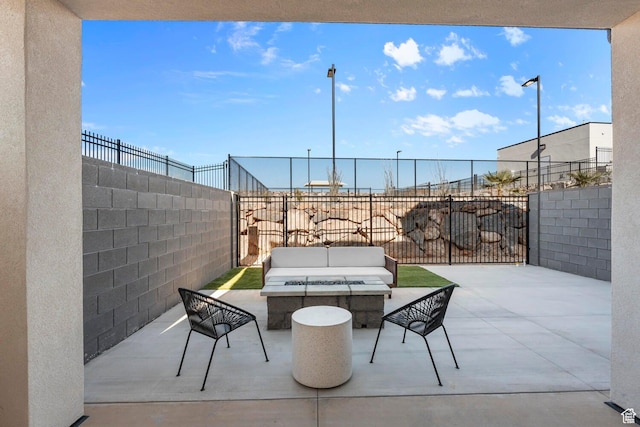1683 S Ripple Rock Dr Unit 3012, Washington, UT 84780 - fenced backyard featuring a patio and an outdoor living space with a fire pit