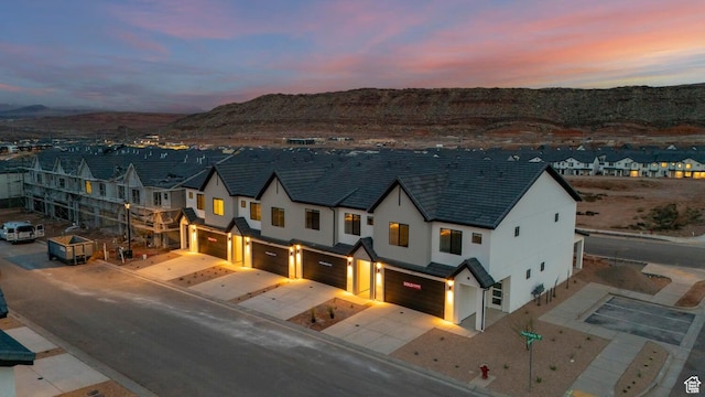 1683 S Ripple Rock Dr Unit 3012, Washington, UT 84780 - aerial view at dusk of a mountain view and a residential view
